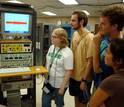 group of students with scientific equipment